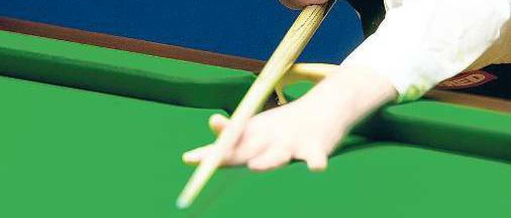 Stoßen noch ohne Zeitdruck. John Higgins fiebert der WM entgegen. Foto: AFP