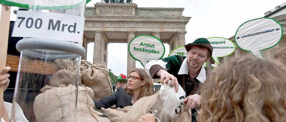 Was man mit Geld alles tun könnte. Zum Beispiel die Armut und den Klimawandels bekämpfen.
