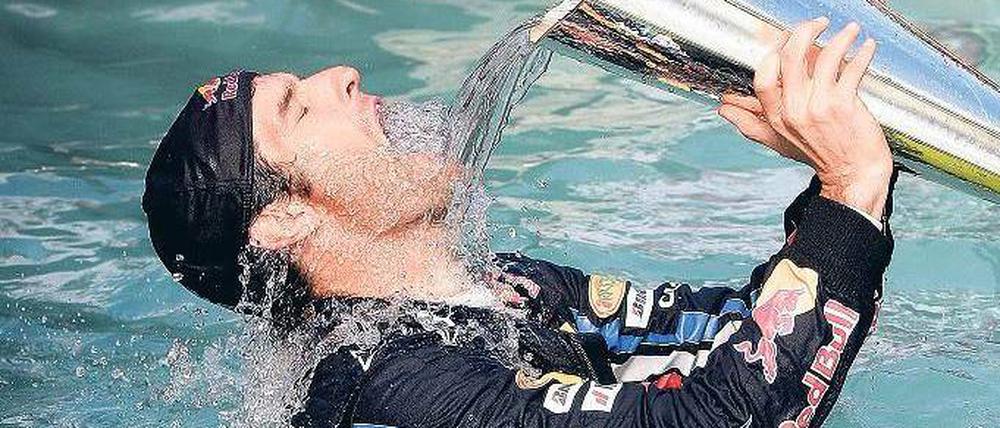 Siegerdusche. Mark Webber gewann die letzten beiden Formel-1-Rennen. Foto: dpa
