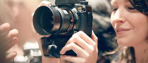 Starke Leistung. Mit Systemgeräten gelingen auch Bilder bei schwierigen Bedingungen wie schwachem Licht. Foto: picture-alliance/dpa