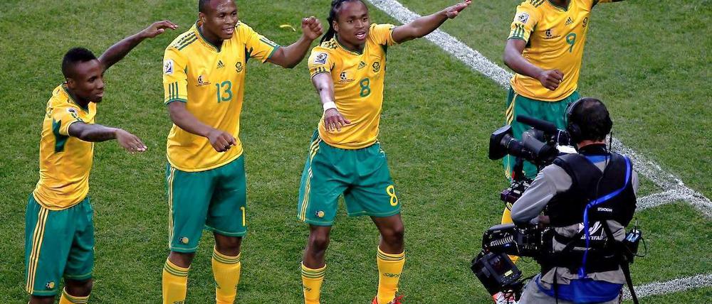 Die Spieler Südafrikas versuchen, sich von der Euphorie tragen zu lassen.