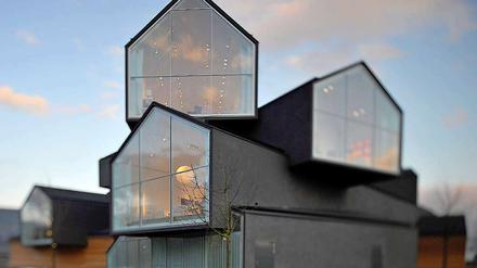 Stapelware: Die Architekten türmten zwölf Gebäuderiegel übereinander.
