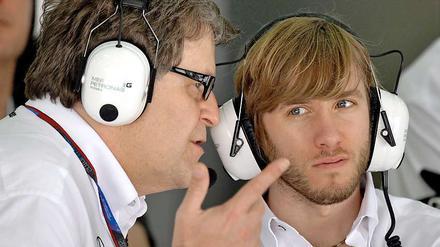 Nick Heidfeld (r.) und Mercedes-Benz-Motorsportchef Norbert Haug.