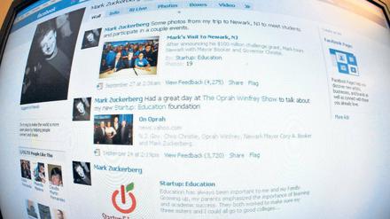 Offen nach vielen Seiten: Die Facebook-Website mit ihren Kontaktmöglichkeiten und diversen Spielen. Foto: AFP