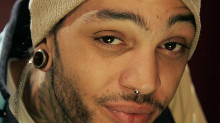 Travis "Travie" McCoy.