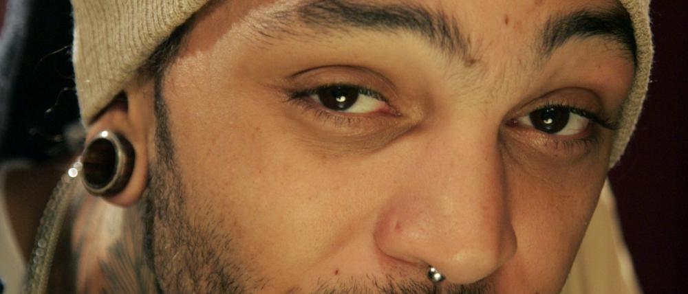 Travis "Travie" McCoy.