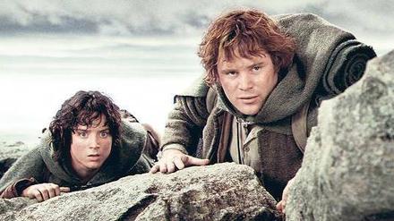 Hobbits auf der großen Reise. Elijah Wood als Frodo Beutlin und Sean Astin als Samweis Gamdschie im Film „Die zwei Türme“ aus der Trilogie „Der Herr der Ringe“. Foto: cinetext
