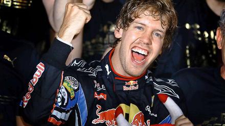 Strahlender Sieger: Der Formel-1-Weltmeister Sebastian Vettel kommt nach Berlin.