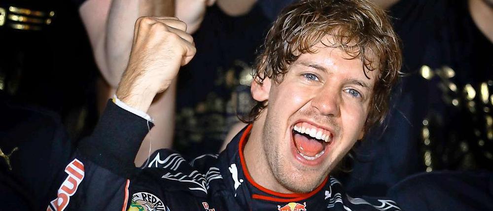 Strahlender Sieger: Der Formel-1-Weltmeister Sebastian Vettel kommt nach Berlin.