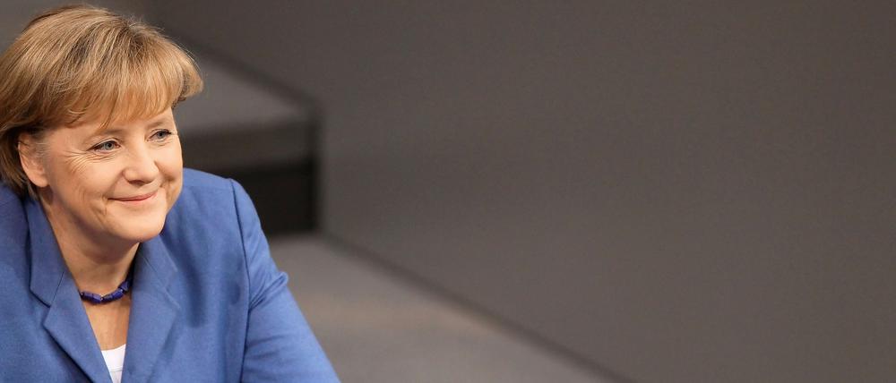 Merkel freute sich bei der Haushaltsdebatte vor allem über Gummibärchen.