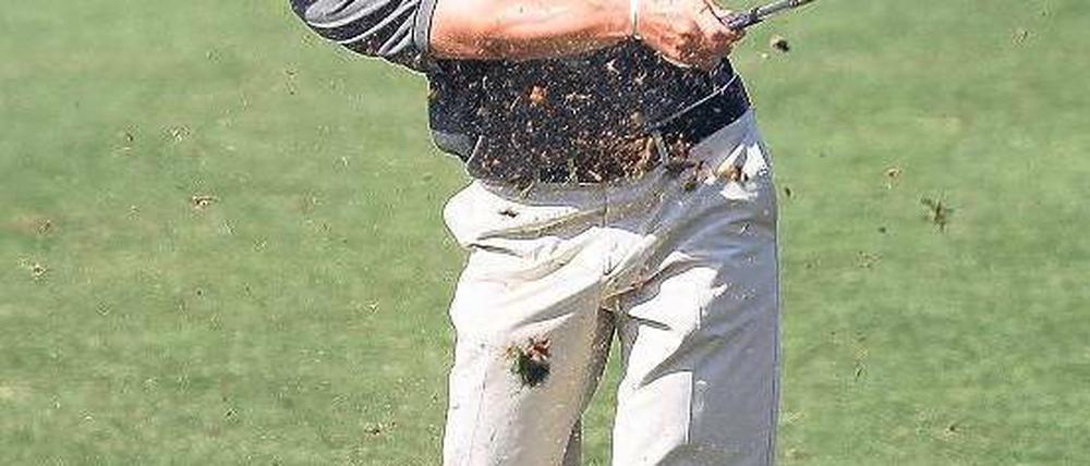 Drecksarbeit. Martin Kaymer verdiente gestern 1,5 Millionen US-Dollar. Foto: dpa