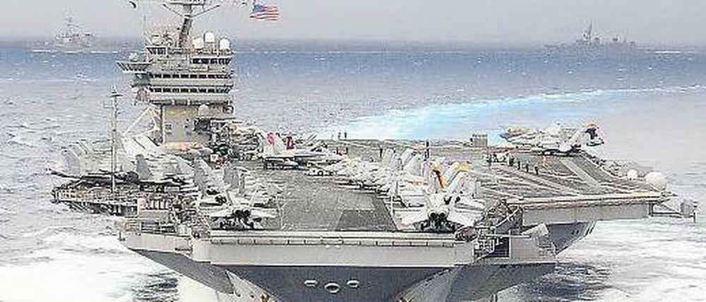 Demonstration der Stärke. Der US-Flugzeugträger „George Washington“ nimmt am Manöver teil.Foto: rtr