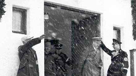 Hauptquartier der Nazigrößen. Im Olympia-Haus in Garmisch-Partenkirchen residierten 1936 unter anderem Hitler (o.) und seine Adjutanten Goebbels und Göring.