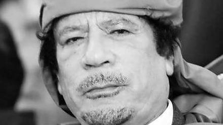 Muammar al Gaddafi.