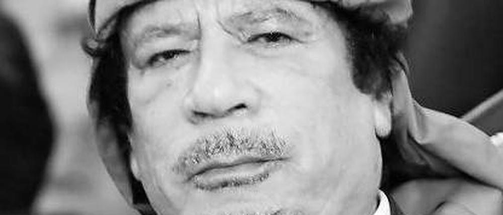 Muammar al Gaddafi.