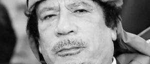 Muammar al Gaddafi.