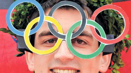 Olympia im Blick. Dieser Zuschauer bei der Ski-WM in Garmisch-Partenkirchen dürfte nicht zu den Gegnern der Münchner Bewerbung gehören.