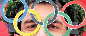 Olympia im Blick. Dieser Zuschauer bei der Ski-WM in Garmisch-Partenkirchen dürfte nicht zu den Gegnern der Münchner Bewerbung gehören.