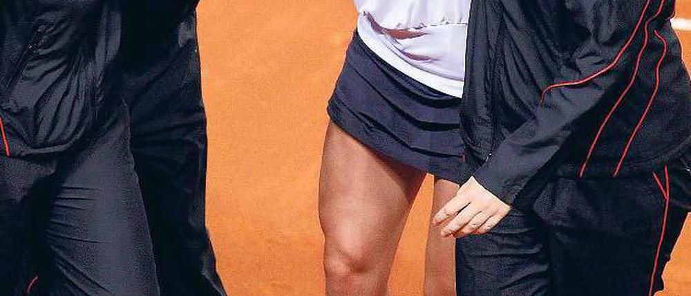 Im Kreis der Siegerinnen. Die deutsche Fed-Cup-Mannschaft mit Andrea Petkovic (zweite von rechts) feiert die Rückkehr in die Erstklassigkeit. Foto: dadp