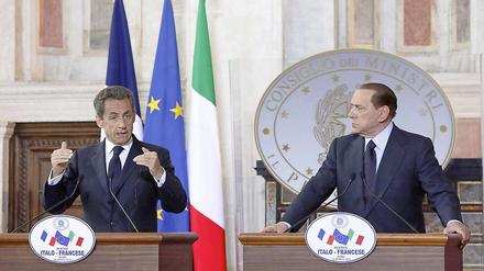 Frankreichs Präsident Nicolas Sarklozy und der italienische Ministerpräsident Silvio Berlusconi.