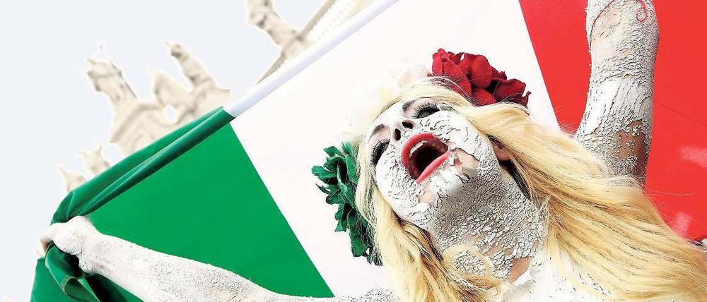 Der Protest hat geholfen. Auch Frauengruppen demonstrierten in Rom gegen Berlusconi. Sein Rücktritt steht nun bevor. 
