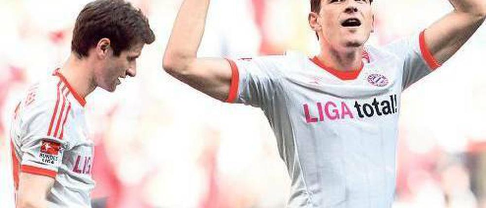 Zwei Mann, zwei Tore. Thomas Müller (links) und Mario Gomez erzielten die Treffer beim Sieg der Bayern gegen Stuttgart.