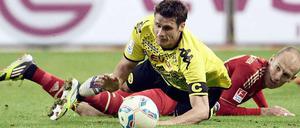 Obenauf. Zuletzt hatte Borussia Dortmund (im Bild Sebastian Kehl) in den Duellen mit dem FC Bayern (mit Arjen Robben) das bessere Ende für sich.