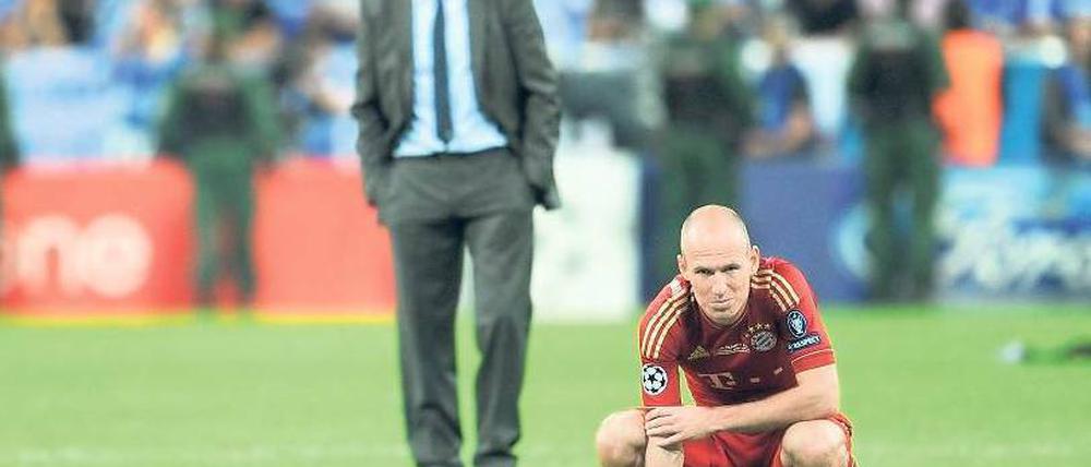 Verschwommene Zukunft. Das Champions-League-Finale könnte den Abschied von Heynckes (l.) und Robben eingeleitet haben. Foto: dpa