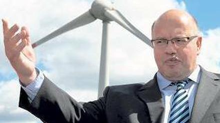 Bundesumweltminister Altmaier steht einem Anti-Dumping-Verfahren in der Solarbranche offen gegenüber – dies sei zunächst aber nicht Sache der Politik. Foto: dapd
