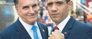 So nah wie ihre beiden Doubles Mike Cote (l.) und Louis Ortiz sind sich Herausforderer Mitt Romney und US-Präsident Barack Obama noch nicht gekommen. Foto: AFP