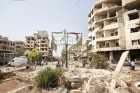 Zerstörte Häuser wie hier in Darayya bei Damaskus sind in vielen Städten in Syrien zu sehen.