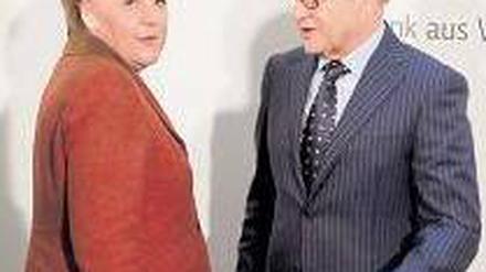 Viel Feind, viel Ehr. Angela Merkel und „Weisen“-Chef Wolfgang Franz. Foto: dpa