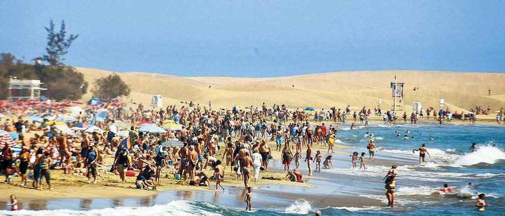 Das kann voll werden. Der Strand von Maspalomas auf Gran Canaria ist selten verwaist. Das wird sich erst recht in der bevorstehenden Saison nicht ändern. Foto: Soeren Stache, dpa