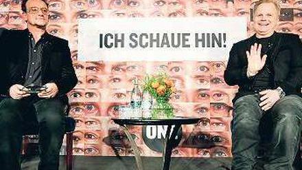 Ich schaue hin. Bono von der Band U2 und Herbert Grönemeyer am Montag. 
