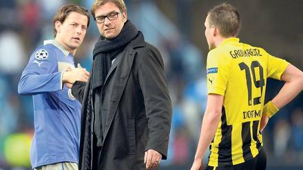 Schwer zu deuten. Die Dortmunder (hier Trainer Klopp mit Weidenfeller und Großkreutz) hadern zwar mit dem 0:0 aus dem Hinspiel, glauben aber ans Weiterkommen.
