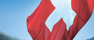 Auf der Sonnenseite war die Schweiz jahrzehntelang auch durch ihre Diskretion in Sachen Finanzen. Doch nun wollen Luxemburg und Österreich stärker mit dem Ausland kooperieren – auch die Eidgenossen denken um. Foto: dpa