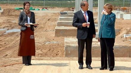 Nicht George Clooney: Angela Merkel mit Nestlé-Chef Paul Bulcke.