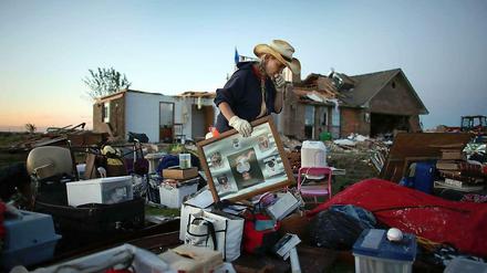 Mehrere Tornados haben in den US-Bundesstaaten Oklahoma und Missouri schwere Verwüstungen angerichtet. Dieses Haus in El Reno, Oklahoma, ist nahezu vollständig zerstört.