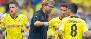 Macht's noch einmal, Jungs - aber diesmal noch besser: Trainer Jürgen Klopp schwört seine Spieler auf die Bayern-Jagd ein.
