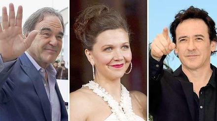 US-Regisseur Oliver Stone, die Schauspieler Maggie Gyllenhaal und John Cusack. 