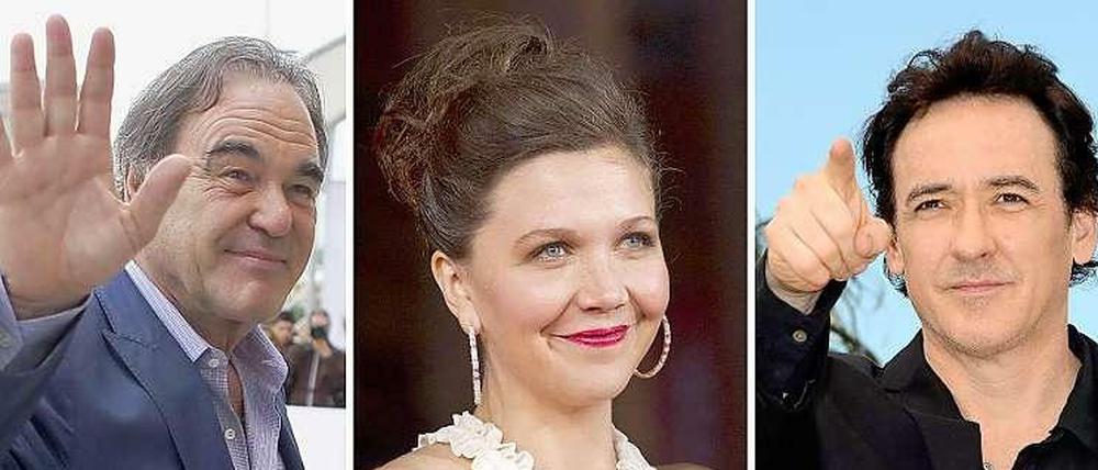 US-Regisseur Oliver Stone, die Schauspieler Maggie Gyllenhaal und John Cusack. 