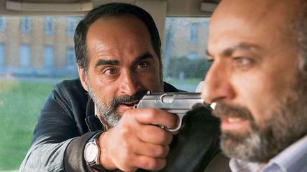 Von den Wirren des Krieges eingeholt: Harun (Navid Negahban, links) bedroht seinen in Deutschland lebenden Bruder Nagib (Husam Chadat).
