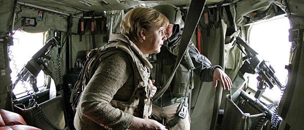 171559_3_071103_merkel_dpa.jpg