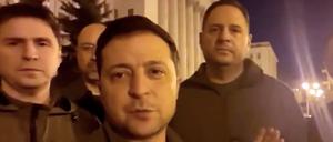 February 25, 2022, Kyiv, Ukraine: Ukrainian President VOLODYMYR ZELENSKY, surrounded by several top officials, addressed the country Friday night local time from the doorstep of the presidential administration in central Kyiv to show he and other leaders haven't fled the capital. (Credit Image: © Ukrainian President's Office/ZUMA Press Wire Service