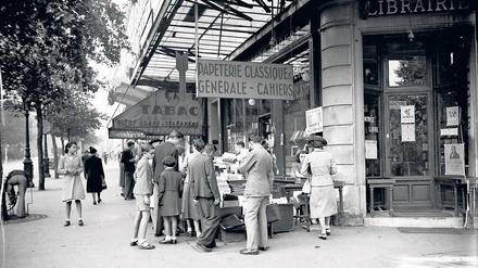 Heute befindet sich hier immer noch die Librairie Gilbert. Der Pariser Boulevard Saint-Michel um 1938/39. Foto: ullstein bild/Roger Viollet