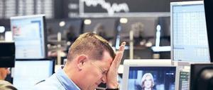 Zum Verzweifeln. Die Turbulenzen an den Finanzmärkten belasten auch die Versicherungsunternehmen. Foto: ddp
