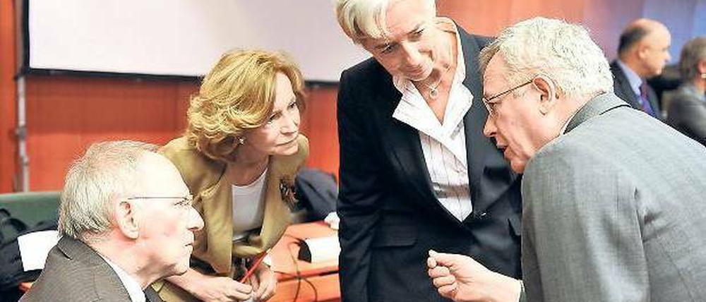 Gespalten. Finanzminister Wolfgang Schäuble (CDU, links) ist mit seinen Ressortkollegen aus Spanien, Frankreich und Italien einig – mit den Koalitionspartnern noch nicht.