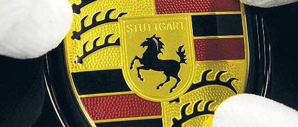 Gut platziert. Porsche gibt bis zu 131,25 Millionen Aktien zu je 38 Euro aus. Von den Familien Porsche und Piëch kommen 2,25 Milliarden Euro, von Katar 250 Millionen Euro. Foto: dpa