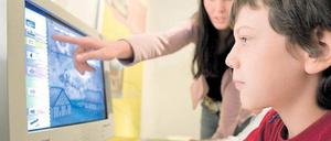 Lehrreich. Gehört der Computer schon in die Grundschule? Das ist hier die Frage. Wir stellen das Thema zur Debatte. Foto: dpa
