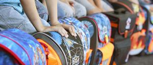 Welches Kind darf seinen Ranzen in welche Schule tragen?